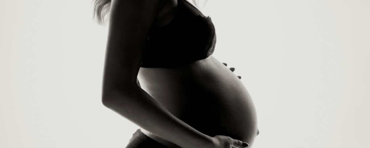 a pregnant woman in underwear - acupuncture for morning sickness